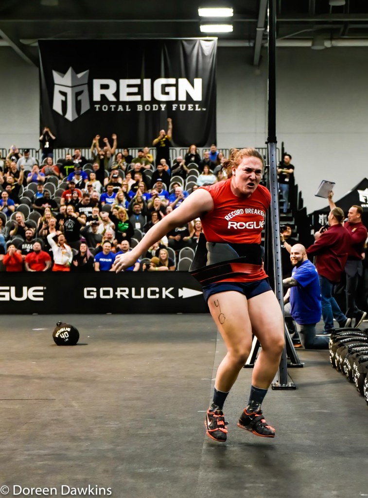 Strongwoman Hannah Linzay celebrating after setting a world record for the sandbag throw over a 15 feet bar, Arnold Sports Festival 2020
